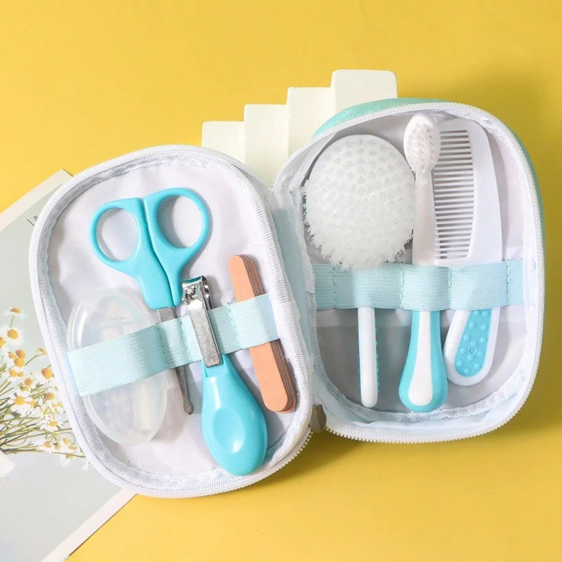 6-in-1 baby grooming kit with scissors, nail clipper, brush, comb, nasal inhaler, and nail file on yellow background, ideal for ages 0-2.