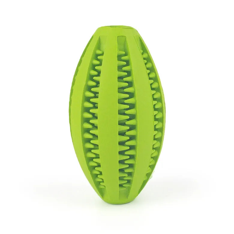 Green natural rubber chew ball for dogs, designed to clean teeth and hold treats, perfect for fetch and teething.