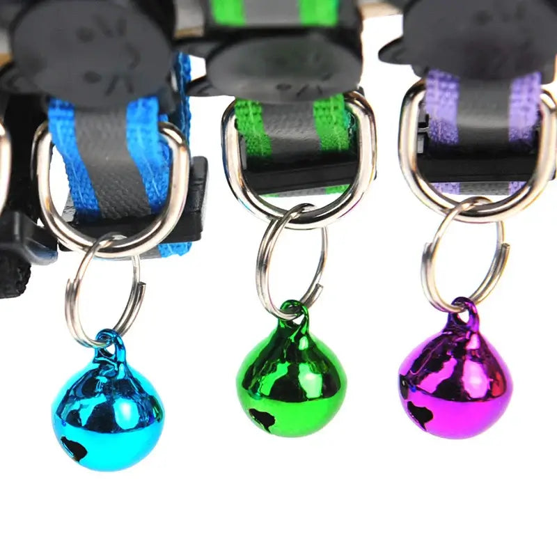 Reflective cat collars with colorful bells, featuring adjustable size and safety light.