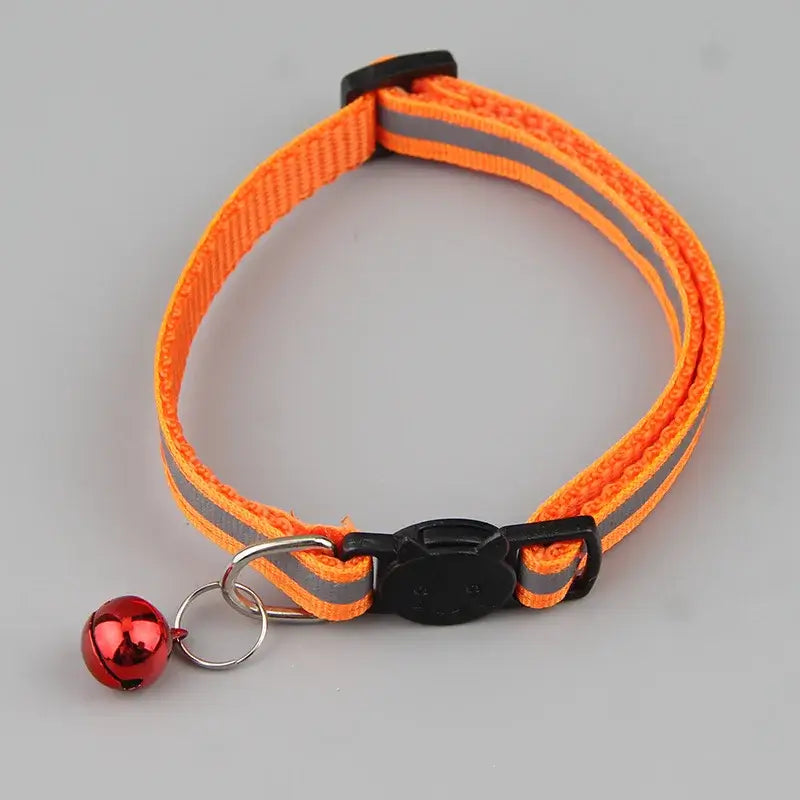 Reflective orange cat collar with bell, adjustable size 19-32 cm, enhances safety with flashing light, stylish for cats and small pets.