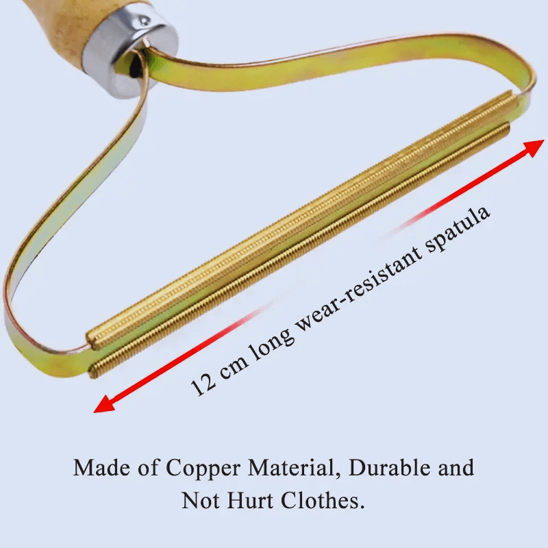 Lint remover with a 12 cm copper spatula, durable for clothes; highlighted for its wear resistance and gentle action.