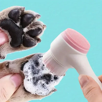 Silicone dog paw cleaner and massage tool gently scrubbing a dog's paw with soapy water, promoting hygiene and healthy claws.