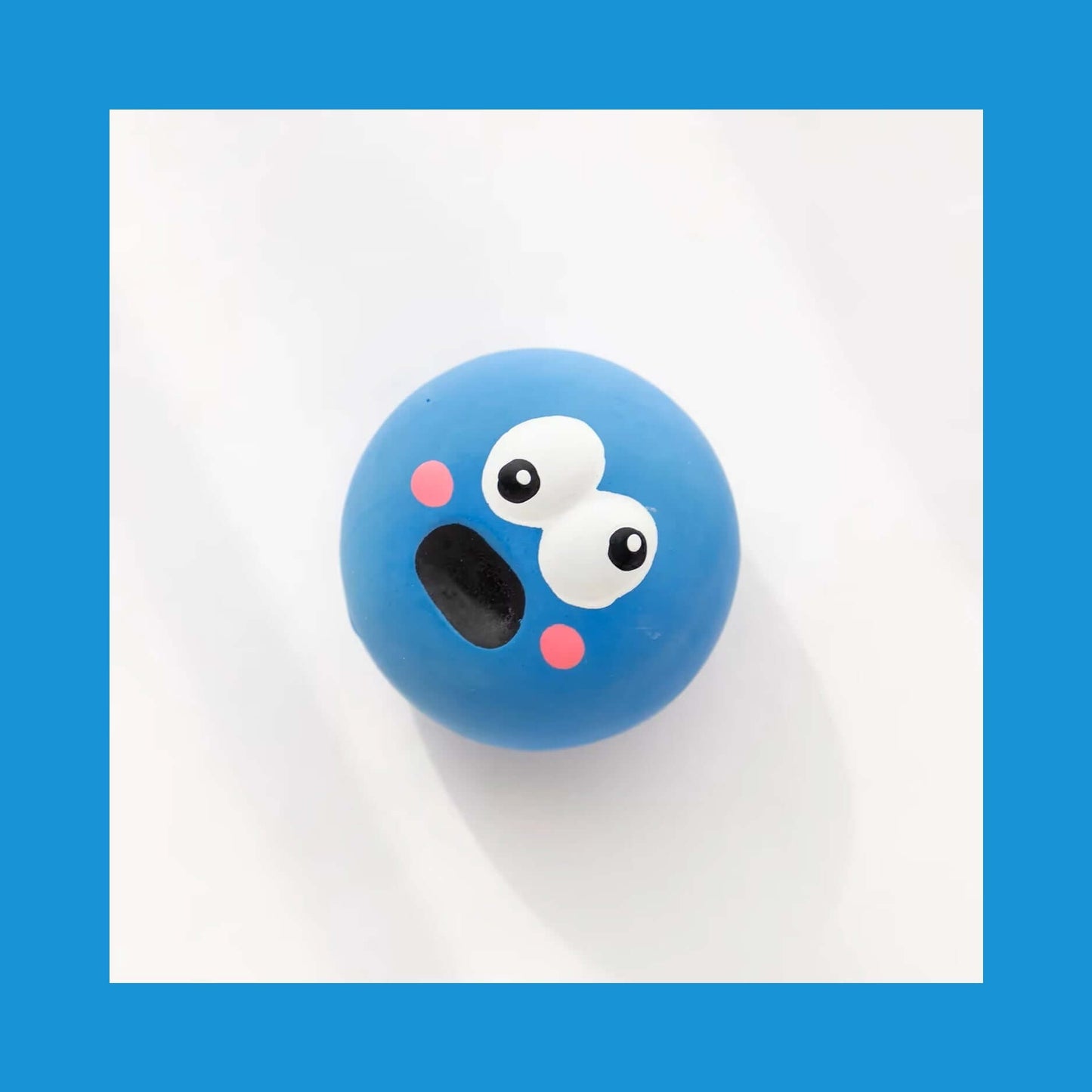 Squeaky Eyeball Dog Toy in blue, featuring durable latex material, ideal for small breeds' playtime and training with engaging squeaky sound.