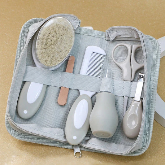 6-in-1 baby grooming set with nail clipper, scissors, soft brush, comb, nasal inhaler, and nail file, safe for ages 0-2.