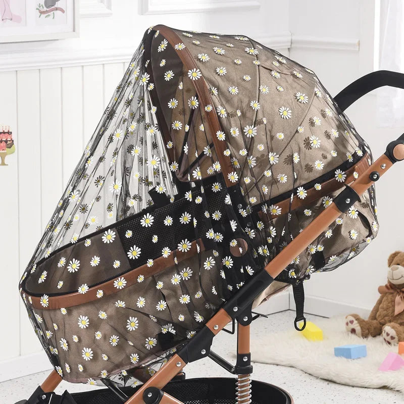 Baby stroller with floral sunshade and bug net, offering mosquito protection and sun coverage for toddlers aged 1-2 years.