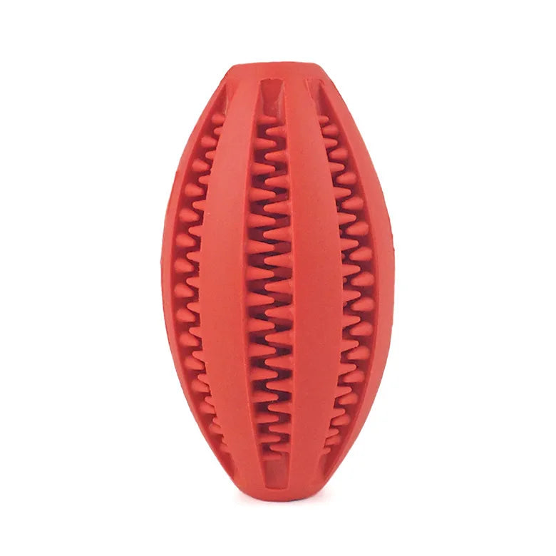 Red natural rubber chew ball for dogs, cleans teeth and holds treats, made from non-toxic material, durable and puncture resistant.
