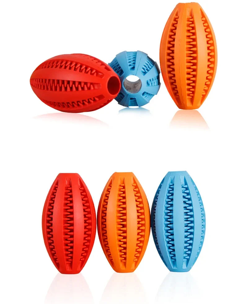 Colorful natural rubber chew balls for dogs, designed for teeth cleaning and treat holding, available in red, orange, and blue.