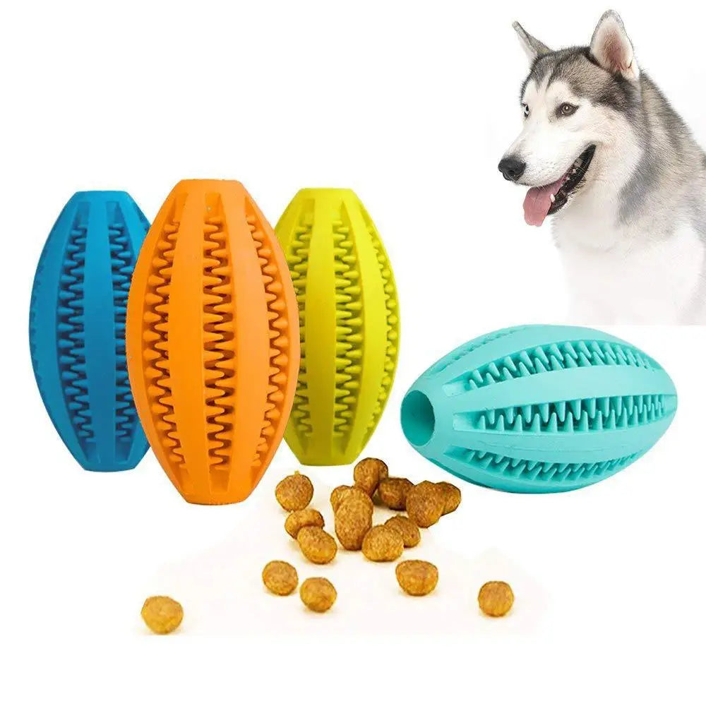 Colorful natural rubber chew balls for dogs with treats, ideal for teething and play, featuring a happy dog in the background.