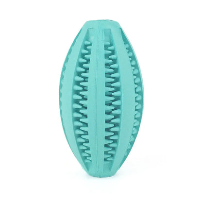 Natural rubber chew ball for dogs with teeth cleaning design and treat holder, made from durable, non-toxic materials.
