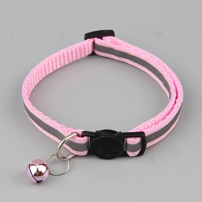 Pink reflective cat collar with bell and adjustable size for safety and style, suitable for cats and small pets.
