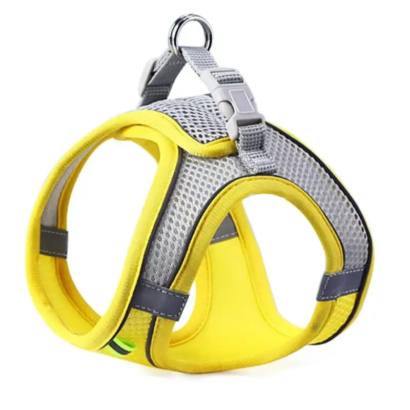 Yellow reflective pet harness with breathable mesh fabric and adjustable straps for secure outdoor walks.