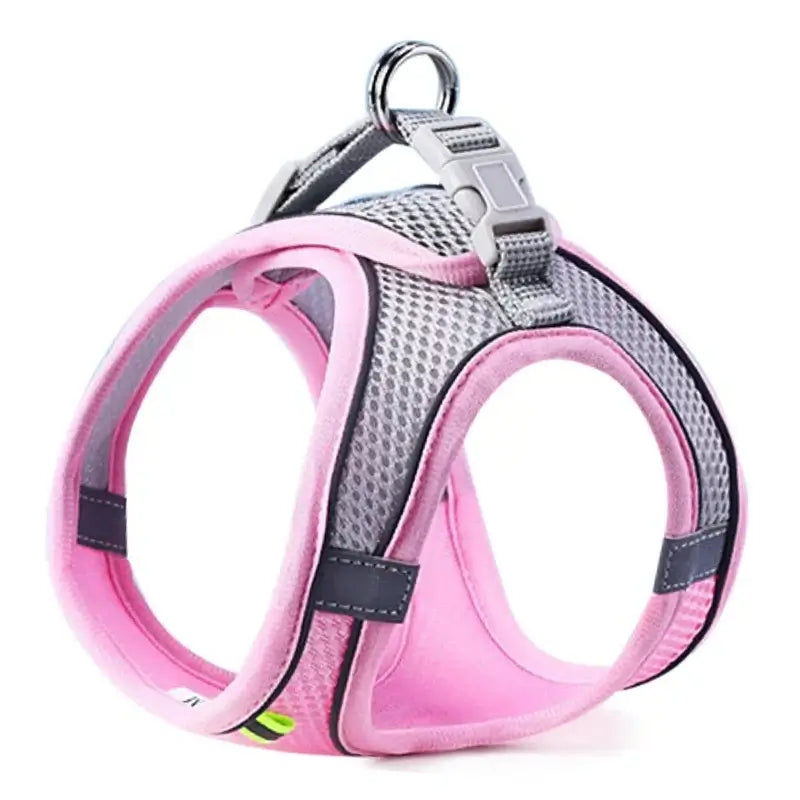 Pink reflective pet walking harness with breathable mesh fabric, adjustable fit, and easy clip-on leash system for safe outdoor walks.