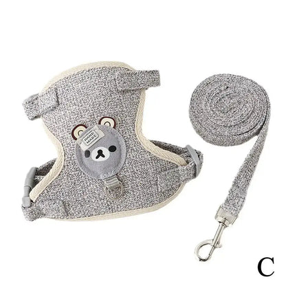 Grey undershirt-style pet harness with bear design and matching leash, breathable and adjustable for small pets.