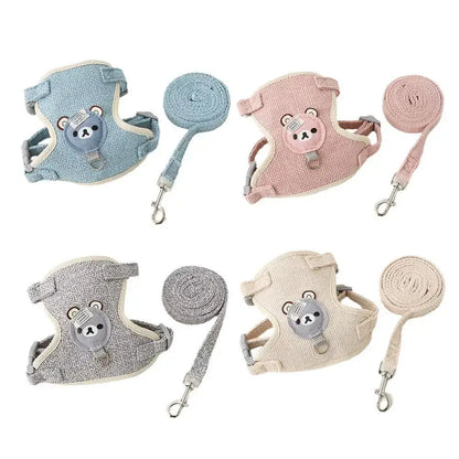 Four undershirt-style pet harnesses with matching leashes in blue, pink, grey, and beige. Safety-focused and breathable design.