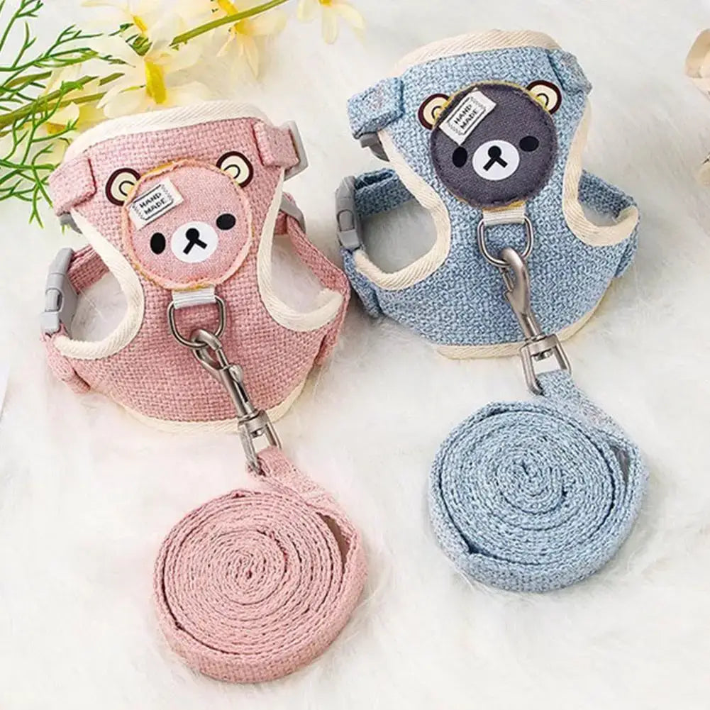 Cute undershirt-style pet harnesses in pink and blue with bear designs, featuring breathable material and adjustable leashes for comfort.